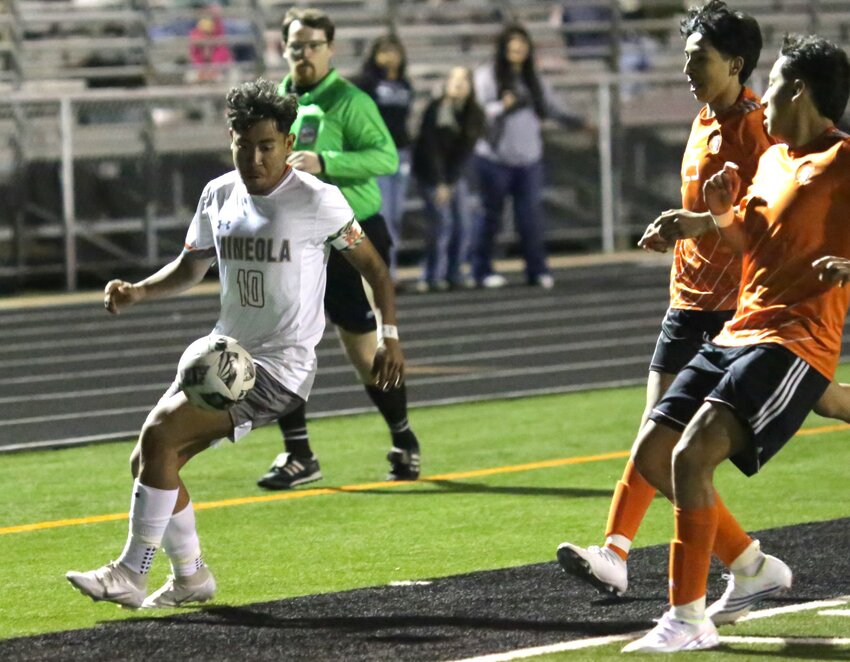 Jonathan Ledesma moments before he cuts between the defenders to set-up his first goal of the game. He tallied both of Mineola&rsquo;s goals in a win at Grand Saline last Tuesday.