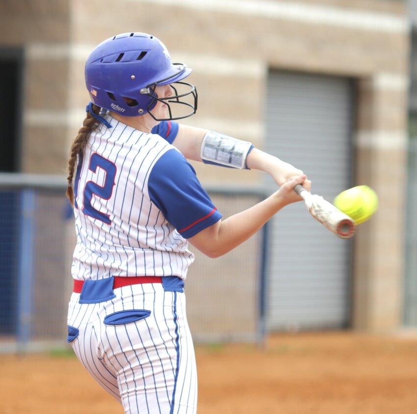 &ldquo;Lady Bulldog Kori Hammond cracks a bases-loaded double in the win against Chapel Hill. (Monitor photo by John Arbter)