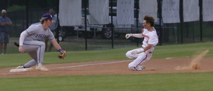 Preston Haskin is thrown out trying to stretch a solid double into a triple early in the Mt Vernon game last Friday.