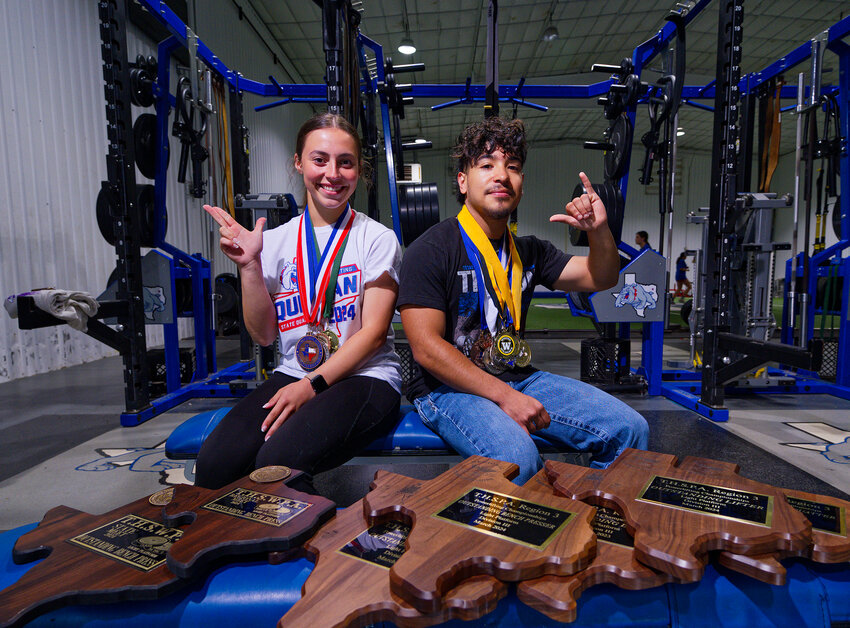 Quitman High School state-qualifying power lifters Addison Marcee and Carlos Flores set some high marks for the program this season.