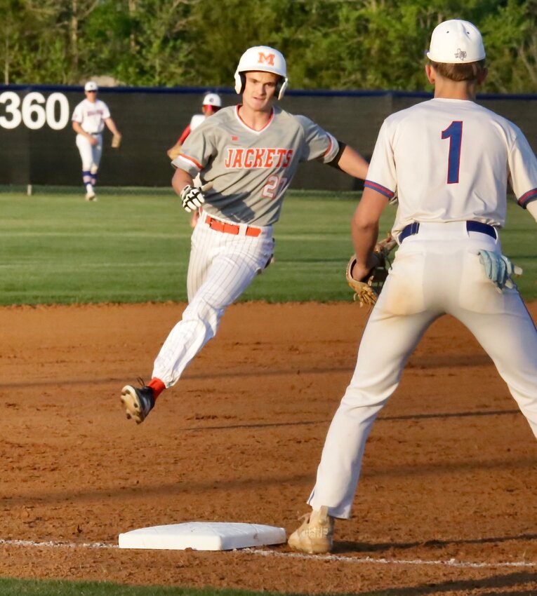 Mineola's Calem Redding cruises into third base with a stand-up triple to open the game Monday, in Quitman. Redding went 3/3 at the plate, scored twice, stole two bases and pitched one inning in Mineola's 4-3 win.