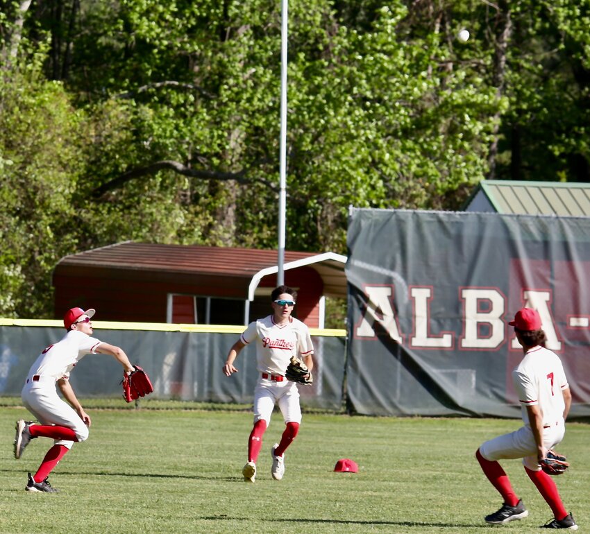 Alba-Golden left-fielder takes a bead on a ball in short left-center. He made a great backhanded diving catch&nbsp;on the ball. Also closing the play were centerfielder Cooper Christian and shortstop Boogie Trimble.