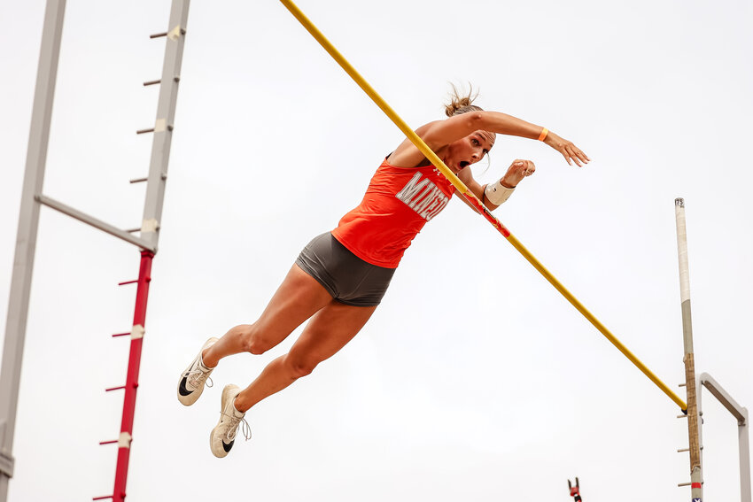 Tierany Neighbors of Minoela clears the bar at 14&rsquo; at the regional track meet. (Photo by Lillian Desiree Photography) See more photos at https://lilliandeleon.smugmug.com