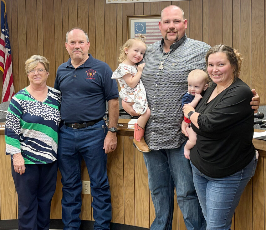 From left, Carla and Scott Wheeler and McKenna, Colton, Morgan and Nikki Otto.