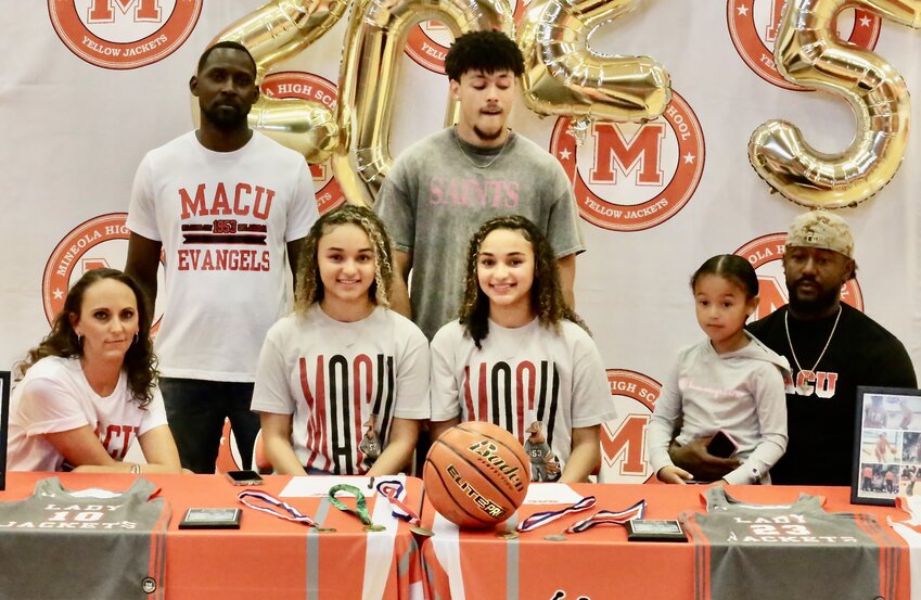 Jayla and Kyra Jackson will be attending Mid-America Christian University in Oklahoma City and playing basketball for the Evangels. From left are Taylor Cummings, Terrance Everett, Jayla Jackson, Braydon Alley, Kyra Jackson, Jemma Jackson and Jermal Jackson.
