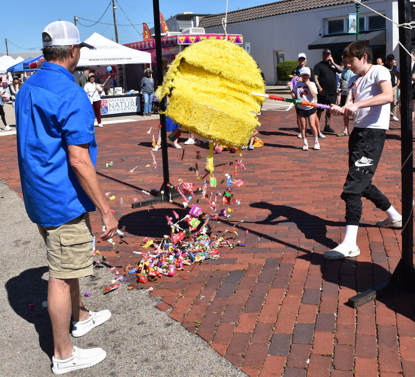 Candy spills from a busted piñata.