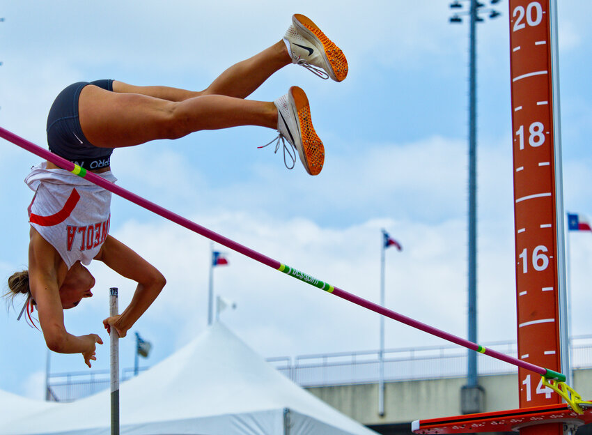 Mineola’s Tierany Neighbors clears the bar at 13’1” to set a state track meet record for Conference 3A last Thursday in Austin.