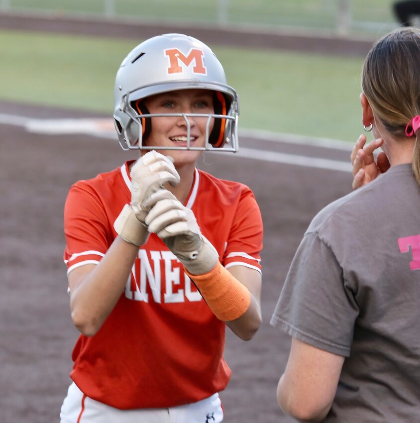Kaitlyn McMahon moments after drilling a 2-RBI triple in the seventh inning.